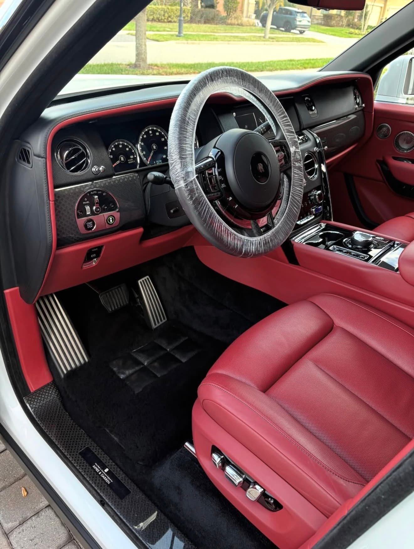 Luxury Rolls-Royce interior with red leather and freshly detailed finish